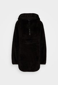 Felpa nera in peluche con zip frontale a metà, tasca kangaroo sotto la patta, tasche laterali con zip e orlo arrotondato.