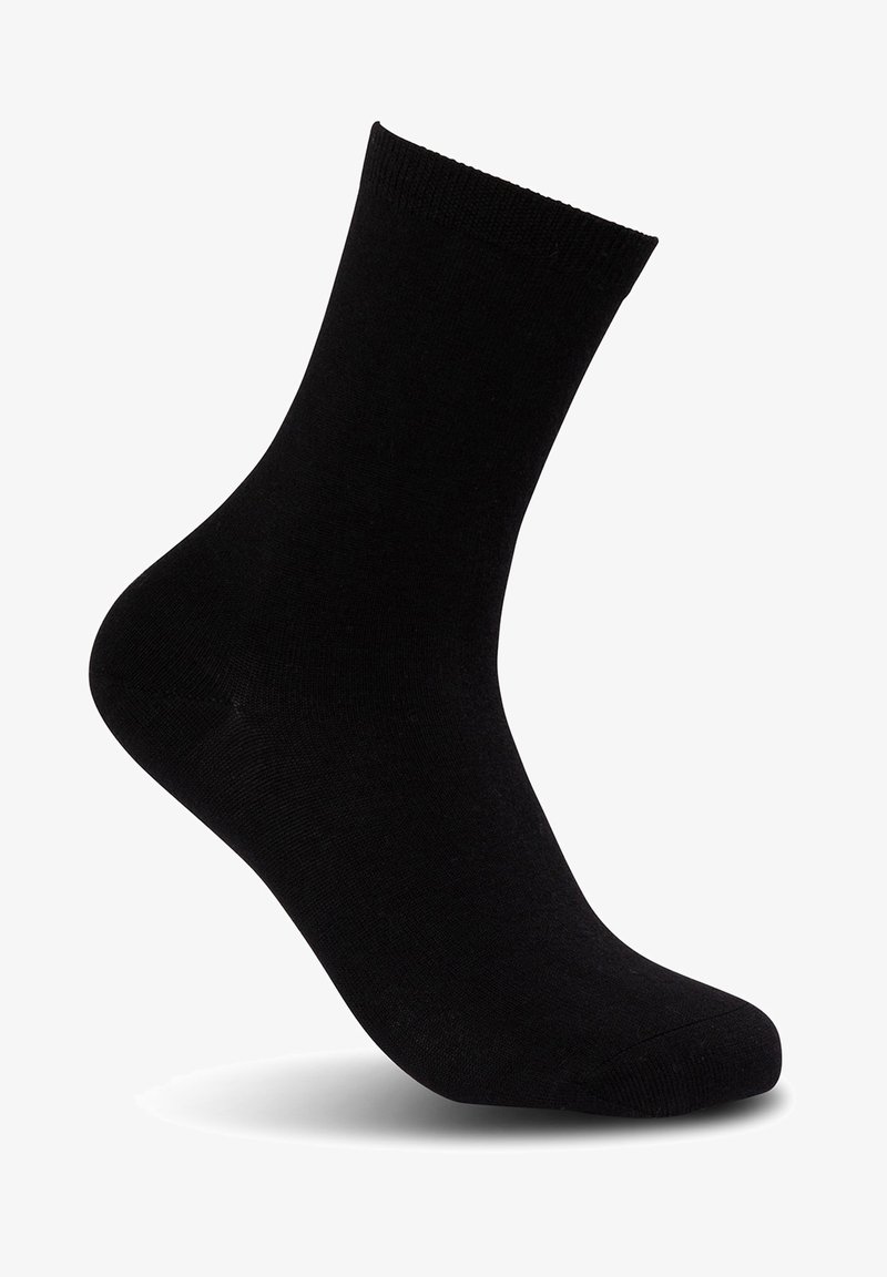 Calcetín negro hecho de un material suave y elástico. Presenta una punta redondeada y un puño acanalado. Diseño simple, sin patrones ni detalles.