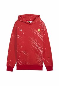Sweatshirt à capuche rouge avec motif éclaboussé blanc, poche kangourou, poignets et ourlet côtelés. Présente un logo Ferrari brodé sur la poitrine.
