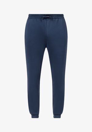 Tmavě modré teplákové kalhoty vyrobené z měkké tkaniny, s elastickým pasem na šňůrku, zúženými nohavicemi a ribbovanými manžetami na kotnících.