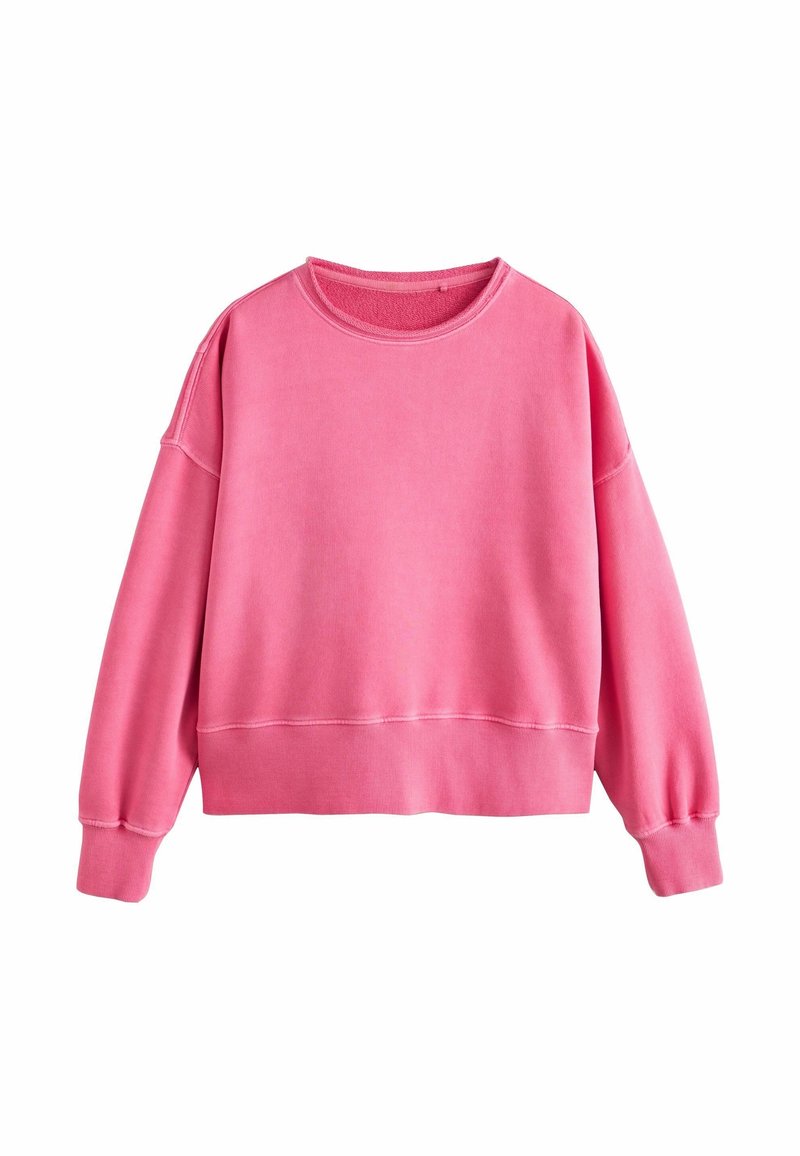 Sweat-shirt rose vif à manches longues et col rond avec poignets et ourlet côtelés, présenté sur un fond blanc.