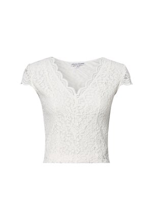Witte kanten cropped top met korte mouwen, gekartelde V-halslijn en bloemenpatroon, maat 36, label “Marie Lund Copenhagen.”