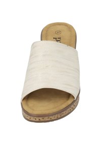Beige slide sandal with a textured fabric upper, open toe, and cushioned insole. Features a light brown, patterned outsole with a neutral color scheme.