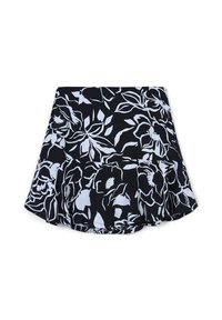 Jupe mini à motif floral noir et blanc avec un ourlet évasé et des volants, posée à plat sur un fond blanc.
