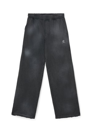 Pantaloni neri a vestibilità ampia con vita elastica, tasche laterali e piccolo logo bianco sull'alta coscia.