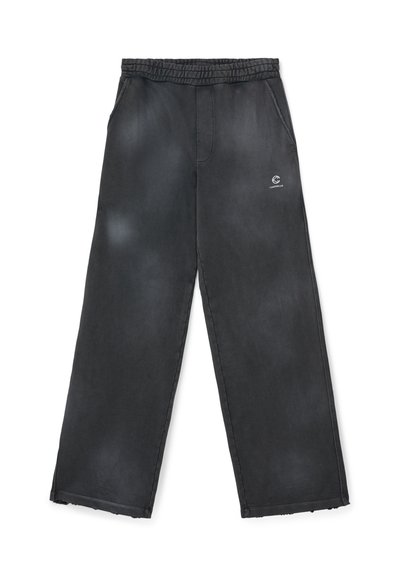 Pantalon noir à coupe ample avec taille élastique, poches latérales et petit logo blanc sur la cuisse supérieure.
