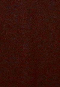 Tessuto rosso scuro con una superficie leggermente texture. La variazione di colore suggerisce una miscela di fibre, che offre una tonalità ricca e profonda.