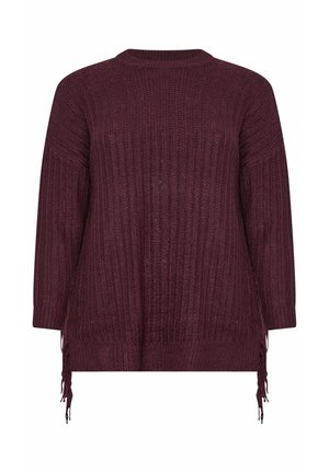 Jersey de punto en burdeos oscuro con textura en canalé, escote redondo, corte oversize y flecos laterales para un detalle adicional.