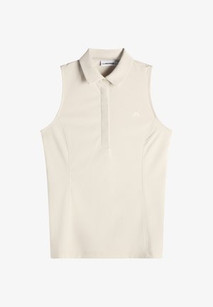 Hiatonen beige-poolopaita, jossa on kaulus ja osittainen napitus, vasemmassa rinnassa pieni kohokuvioitu logo.