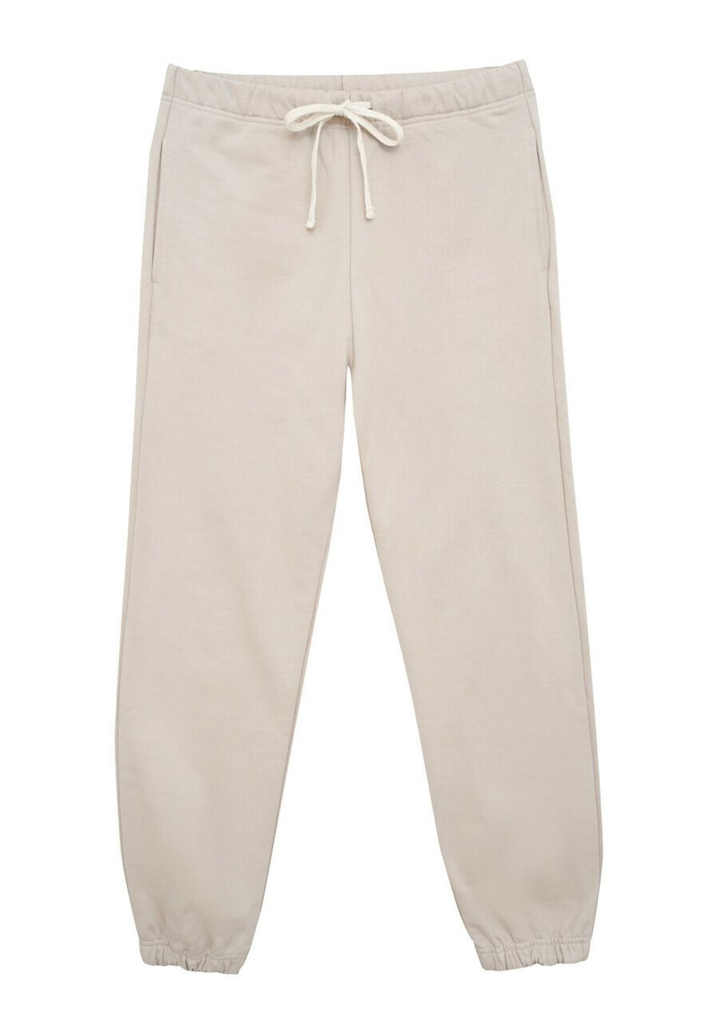 Beżowe spodnie dresowe z elastycznym pasem i regulowanym sznurkiem. Posiadają dwie boczne kieszenie oraz zwężane mankiety na kostkach. Miękka tekstura.