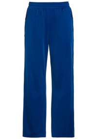 Pantalones deportivos azules con un corte relajado, cinturilla elástica y bolsillos laterales con cremallera para mayor funcionalidad. Textura de tejido suave y ligero.