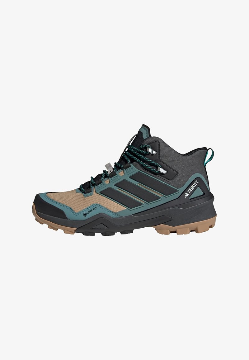 Scarponi da trekking realizzati con una combinazione di materiali neri, verde acqua e beige, dotati di una parte superiore testurizzata, lacci sicuri e suola in gomma robusta per una buona aderenza.