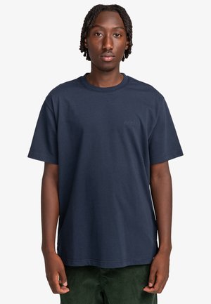 Navy blue cotton t-shirt with short sleeves and a crew neckline. Features a subtle embossed logo on the chest and a relaxed fit.