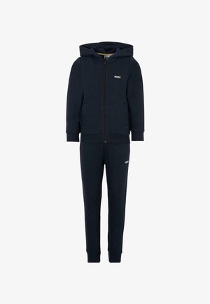 Set di tuta navy composto da giacca con zip e cappuccio e pantaloni con vita elastica. Realizzato in morbido tessuto, decorato con sottili dettagli del logo.