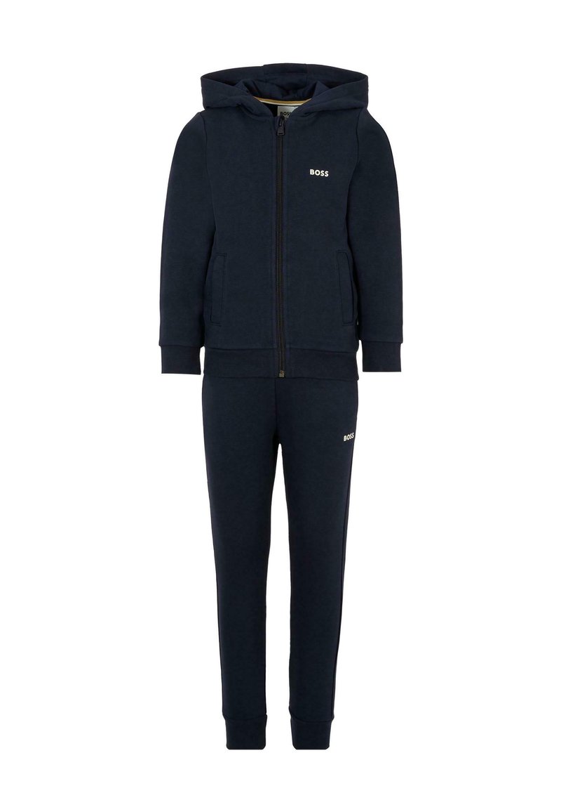 Set di tuta navy composto da giacca con zip e cappuccio e pantaloni con vita elastica. Realizzato in morbido tessuto, decorato con sottili dettagli del logo.