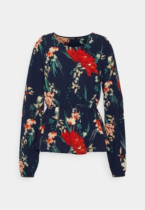 Navy blue long-sleeve blouse with red, beige, and green floral print and a cinched waist detail.
