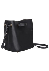 Black leather bucket bag with a smooth texture, side handle, adjustable strap, and gold hardware accents. Features a simple, minimalist design.