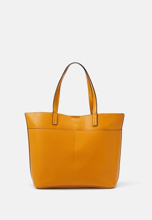 Gelbe Tragetasche mit zwei langen Griffen aus glattem Material. Verfügt über ein minimalistisches Design und dezente Steppnähte.