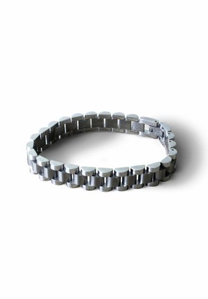 Silver metal watch band with rectangular links arranged in two rows, partially closed, shown on white background.