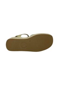 Suola di sandali in gomma tan con superficie testurizzata, logo circolare e indicazione della taglia. Design minimale con una leggera curvatura e bordo arrotondato.