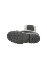Black rubber boot featuring a textured sole with deep treads for traction. Materials include synthetic upper and reinforced heel.