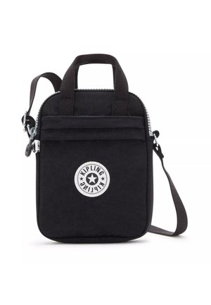 Petit sac bandoulière noir avec poignées supérieures, poche zippée à l'avant et logo rond Kipling sur le panneau avant.
