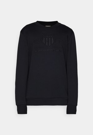 Černá mikina vyrobená z bavlny, s vyvýšeným logem na přední straně, žebrovanými manžetami a kulatým výstřihem. Klasický atletický design.