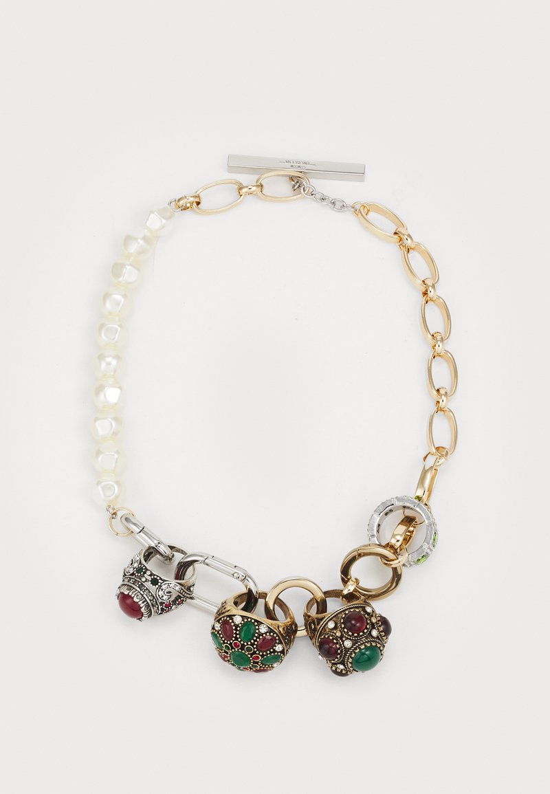 Gold and silver chain necklace featuring a mix of pearl beads and decorative metal charms with red and green accents.