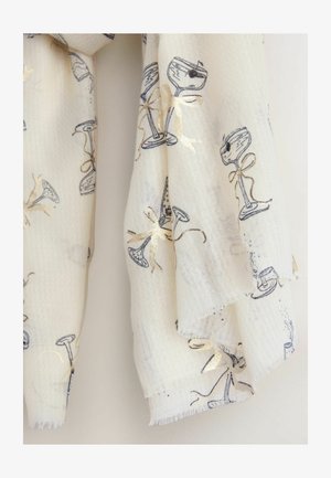 Biely šál s textúrovaným tkaním, so vzorom modrých koktailových pohárov a metalickými zlatými mašľami. Klasické okraje pridávajú detaily.