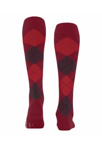 Calzini alti fino al ginocchio rossi con un motivo argyle a rombi in diverse tonalità di rosso e grigio scuro, con contorni a rombo a contrasto, realizzati in un materiale morbido.