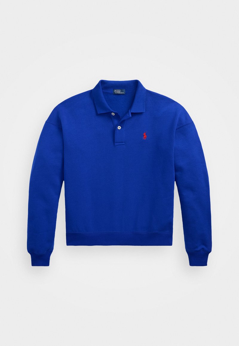 Blå långärmad polo med krage, enkel knappstängning och en liten röd logotyp på vänster bröst. Material i bomullsblandning, texturerad yta.