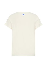 T-shirt crema a maniche corte in morbido cotone. Presenta un collo rotondo, una linea dritta e un piccolo etichetta del logo sul retro.