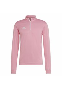 Rosa långärmad tröja med kvartdragkedja, tillverkad av slät tyg. Har ribbade ärmslut och en vit Adidas-logotyp på bröstet.