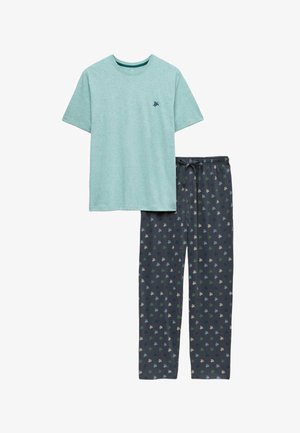 Maglietta a maniche corte verde chiaro con scollo rotondo e piccolo logo a tartaruga, abbinata a pantaloni scuri con motivo a tartaruga multicolore e vita con coulisse.