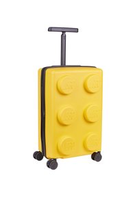 Yellow hard-shell suitcase designed to resemble a LEGO brick, featuring black wheels and a retractable handle, with rounded button-like details.
