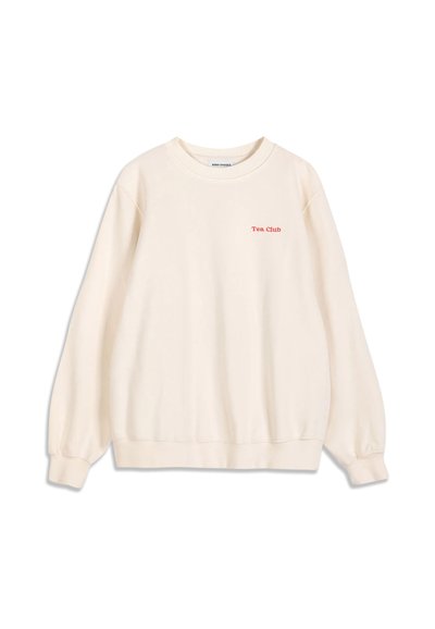 Sweat crème manches longues col rond avec texte rouge ""Tea Club"" sur la poitrine gauche et poignets et bas côtelés.