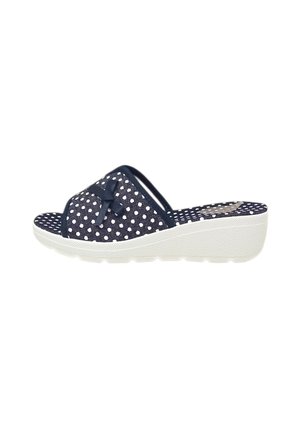 Sandalo slip-on con zeppa blu navy con pois bianchi, piccolo fiocco sulla cinghia e suola bianca strutturata.