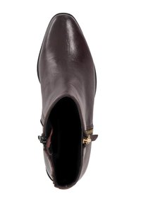 Burgundy leather ankle boot with a pointed toe and gold zipper detail on the side, featuring a smooth texture and a sleek silhouette.