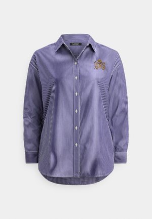 Dolga vijolična in bela s svetlimi navpičnimi črtami srajca z dolgimi rokavi, ovratnikom in gumbi ter z ustavljenim zlatim grbom na levi strani prsnega koša.