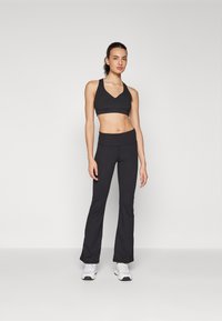 Champion PERFORMANCE FLARE LEGGINS - Leggingek - black