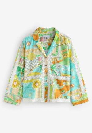 Chemise patchwork colorée avec des motifs graphiques cyan, orange et jaune, col court et délicates accents en dentelle le long des coutures.