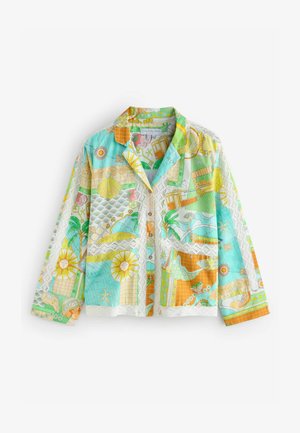 Chemise patchwork colorée avec des motifs graphiques cyan, orange et jaune, col court et délicates accents en dentelle le long des coutures.