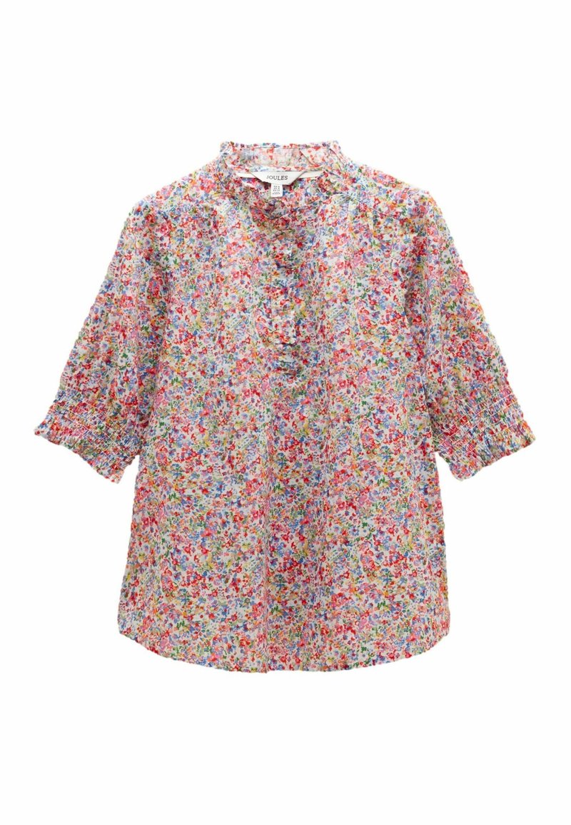 Blouse fleurie avec imprimé de petites fleurs multicolores, manches trois-quarts bouffantes, col volanté et détail de boutons à l'avant.