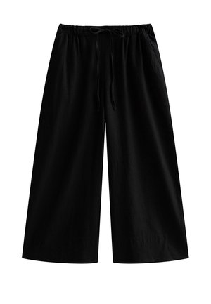 Pantalon noir à jambes larges avec taille élastique et cordon ajustable, deux poches latérales, coupe ample et raccourcie.