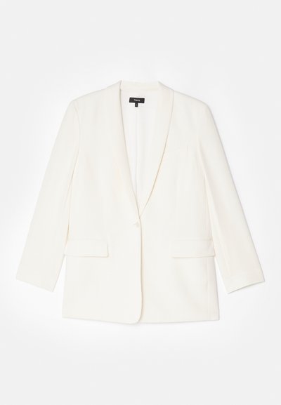 Fehér blézer texturált anyagból, egy gombbal záródik, férfi jellegű hajtókával és két elülső zsebbel rendelkezik. Testhezálló fazon, hosszú ujjak.