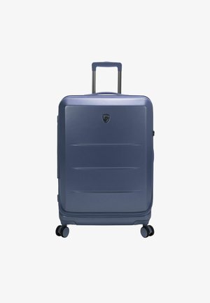 Hartschalenkoffer in Marineblau, mit glatter Oberfläche, horizontalen Rillen, einem ausziehbaren Griff und vier Doppelrollen.