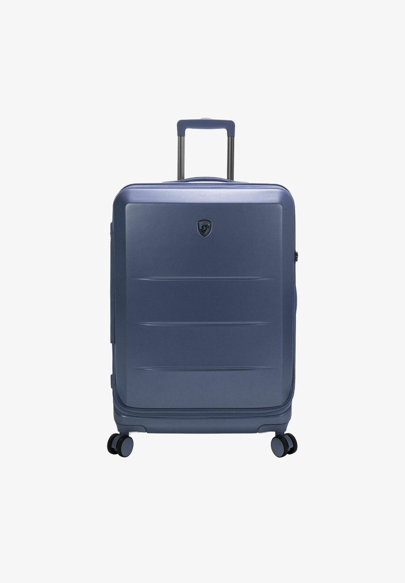 Hartschalenkoffer in Marineblau, mit glatter Oberfläche, horizontalen Rillen, einem ausziehbaren Griff und vier Doppelrollen.