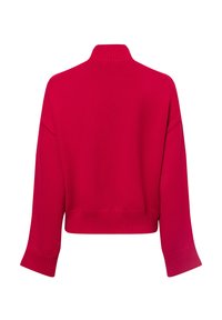 Gekürzter Pullover in leuchtendem Pink, mit geripptem hohen Kragen und weiten Ärmeln, gefertigt aus weichem, strukturiertem Strickstoff.