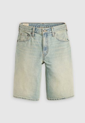 Light blue denim shorts with a relaxed fit, five-pocket design, metal button closure, and contrasting stitching. Soft texture.