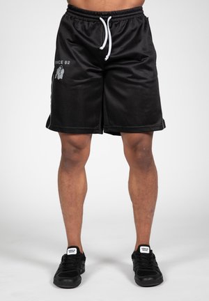 Schwarze Sportshorts aus leichtem, atmungsaktivem Material mit einem Zugbandbund. Mit weißen Akzenten und Branding an der Seite.